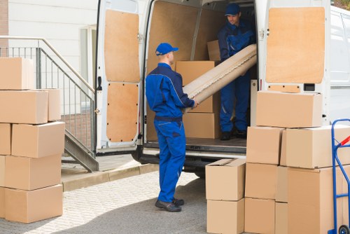 Removal team pricing a Canary Wharf apartment clearance