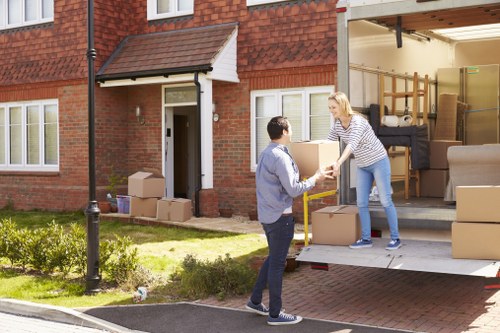 Man and van moving service in Canary Wharf with boxes and furniture