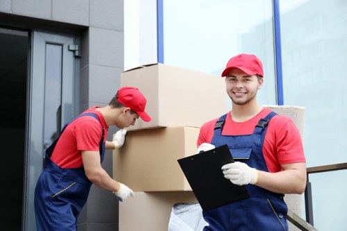 Careful furniture handling during student removals in Canary Wharf