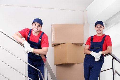 Canary Wharf man and van service near modern apartment buildings