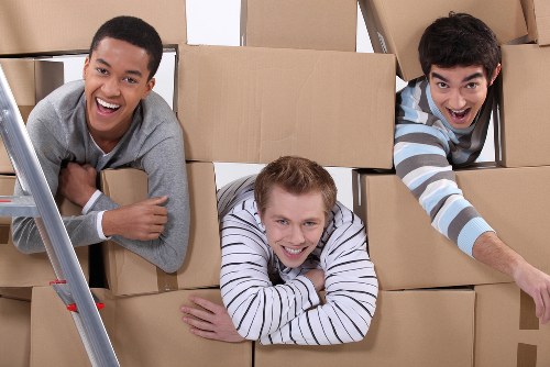 Removal team planning a move in a Canary Wharf apartment building