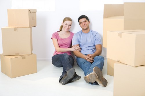 Modern apartment removal in Canary Wharf with moving boxes and equipment