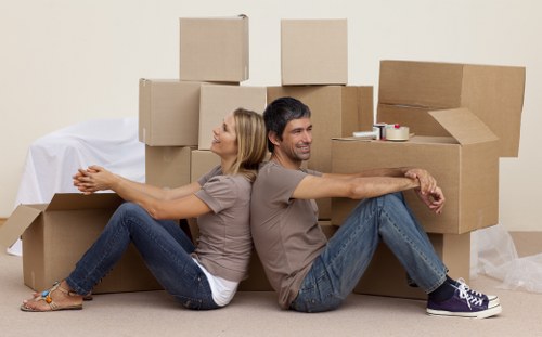 Packed boxes ready for flat removals in a Canary Wharf apartment