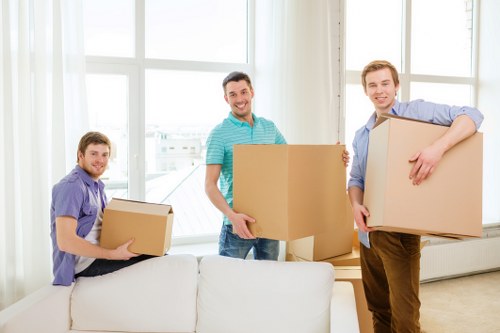 Professional movers coordinating a Canary Wharf commercial move