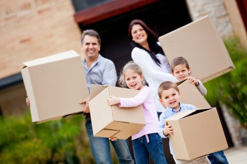Professional movers handling apartment relocation in Canary Wharf
